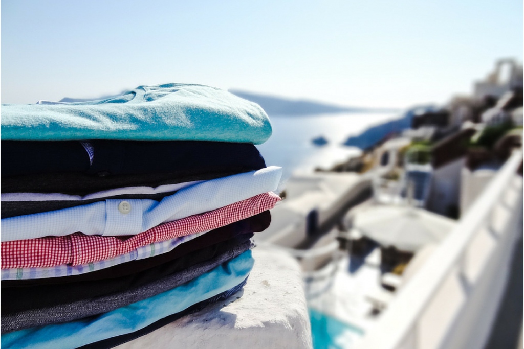 The Mr Collection Pile of Clothes on Railing