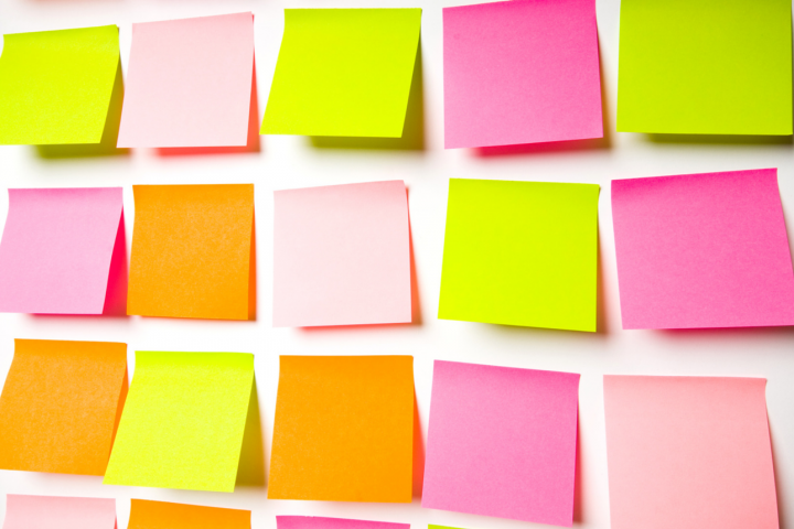 Colourful post it notes on a wall
