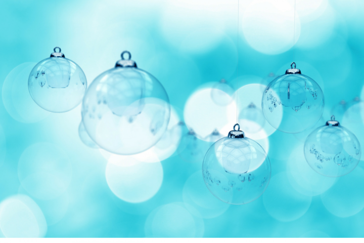 Christmas baubles on aqua background