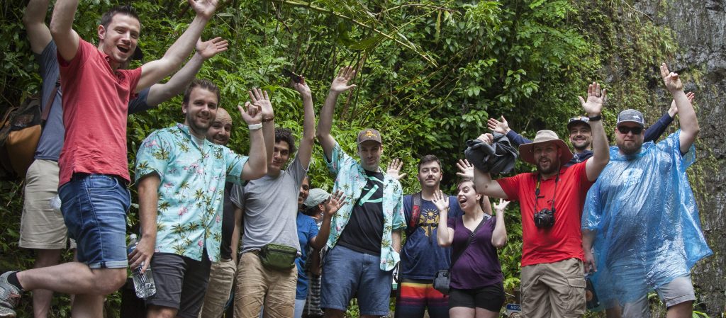 People waving at a waterfall in Prosparadise